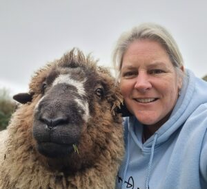 Our office manager Alison, with her opinioned sheep